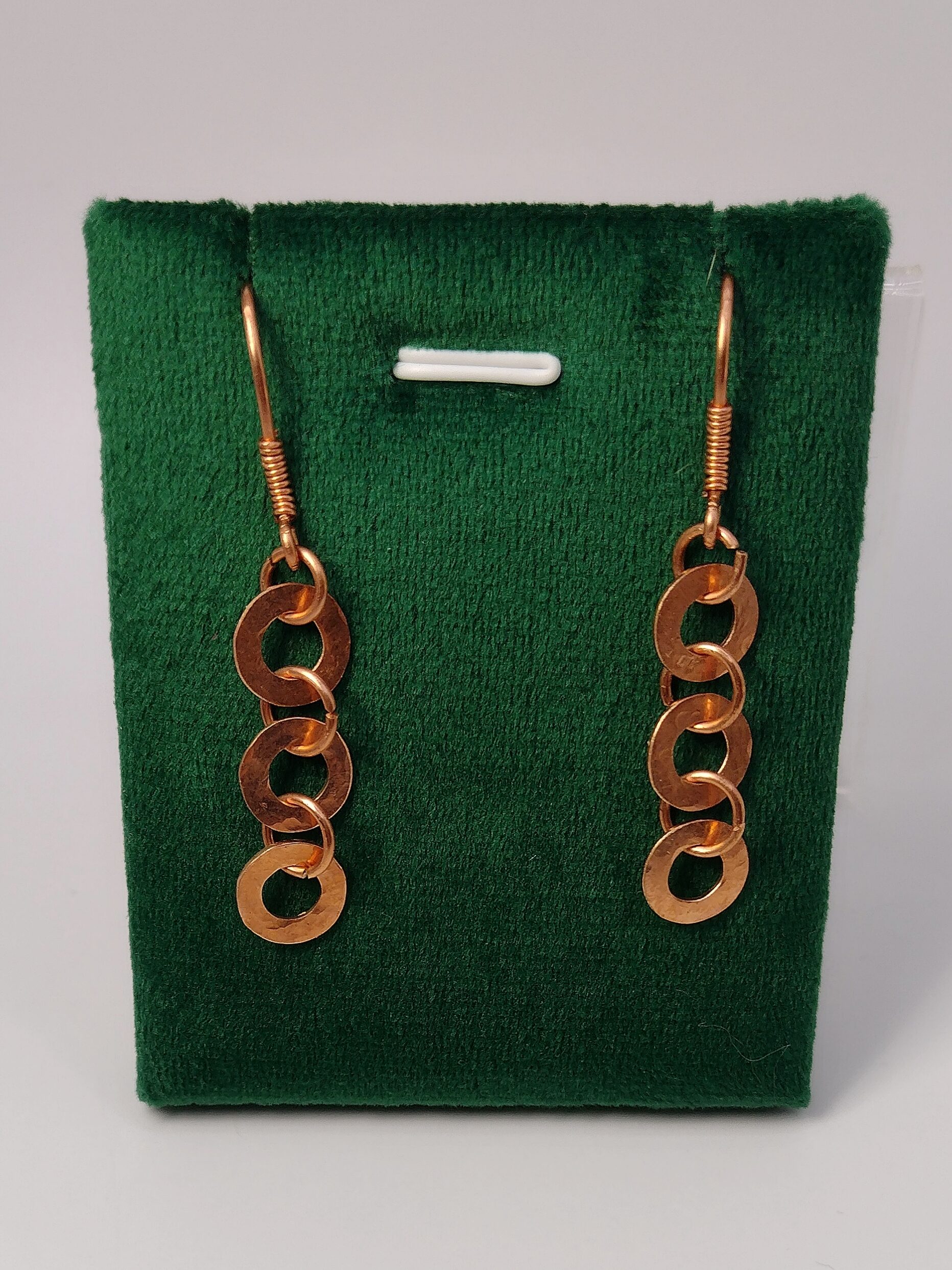 Ręcznie wykonane miedziane kolczyki z pięciu połączonych kół.